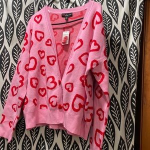 This cardigan is super cute….it’s brand new with tags…